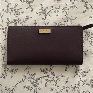 Plum Kate Spade Leather Wallet with Snap Closure